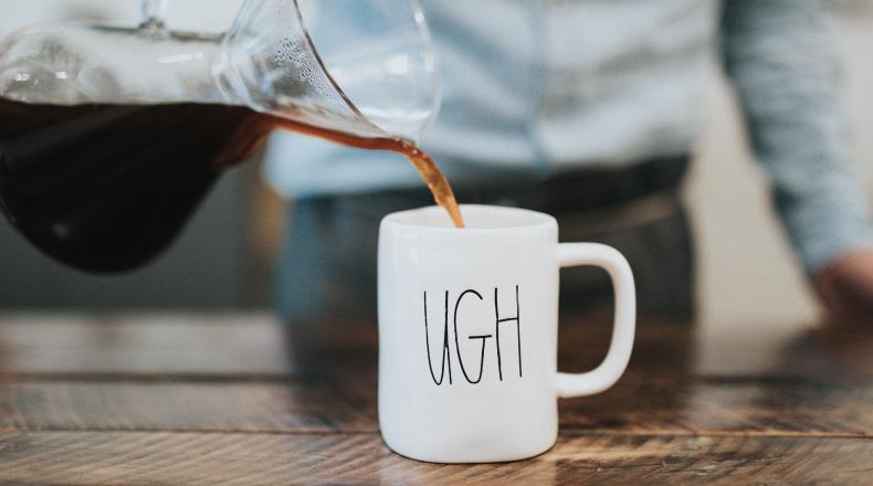 picture of coffee mug that says "ugh"