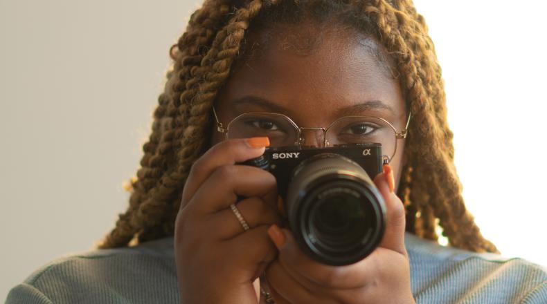 woman holding camera