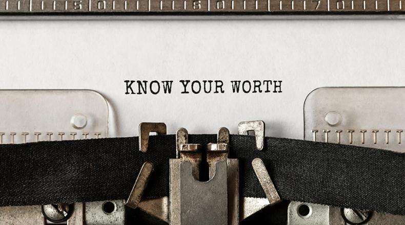 typewriter with paper that says know your worth