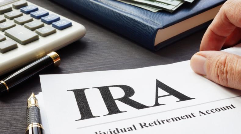 Documents about Individual retirement account IRA on a desk.