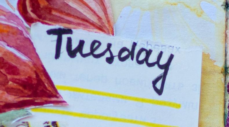 word Tuesday on lined notepaper