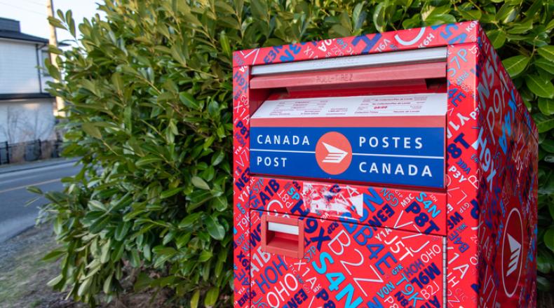 Kaleidoscope pattern Canada Post mailbox stock photo