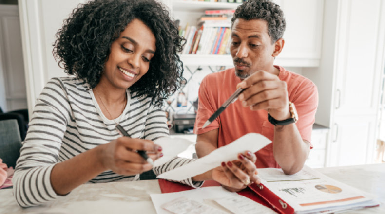 A couple reviewing their taxes