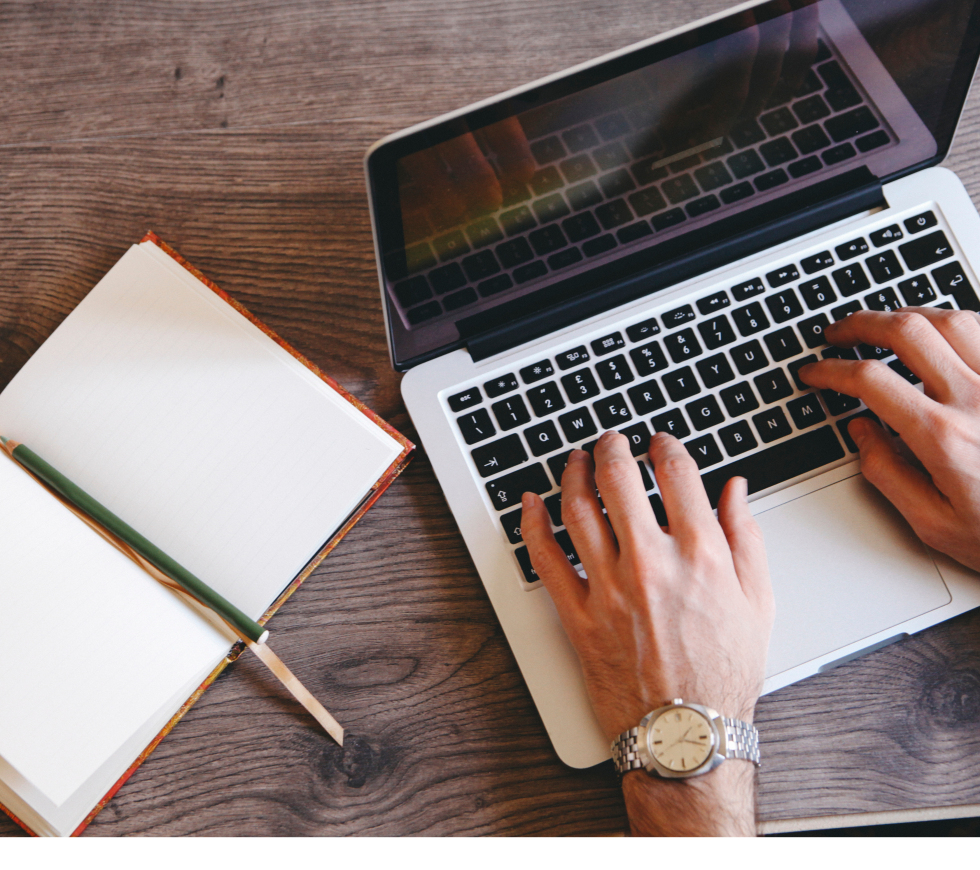 Person typing on a laptop