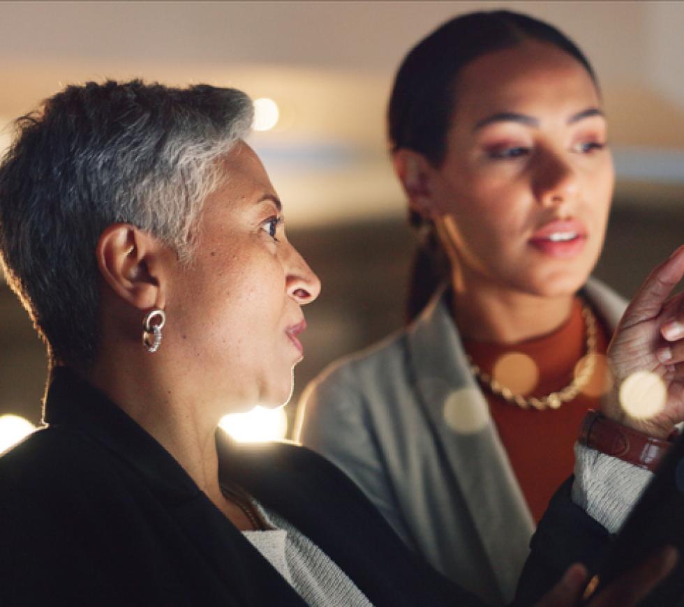 Corporate, talking and business women planning together