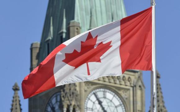 flag over Canadian parliament
