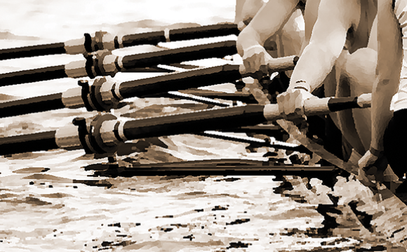Crew team rowing a boat