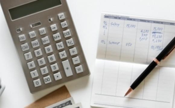 Image of calculator and spreadsheets