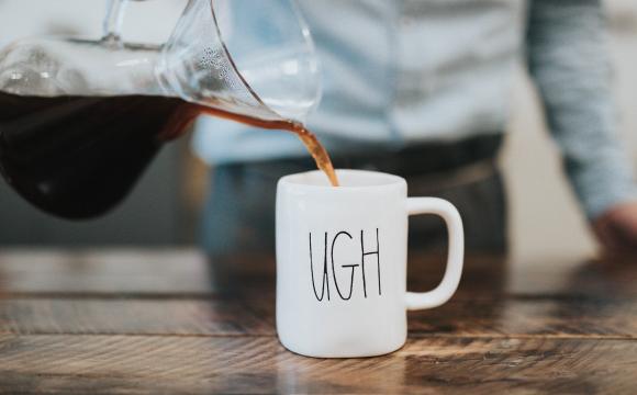 picture of coffee mug that says "ugh"