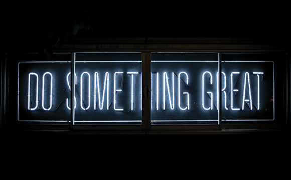do something great in blue neon lights against a black background
