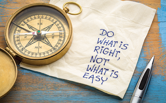 compass on a napkin that says do what is right, not what is easy