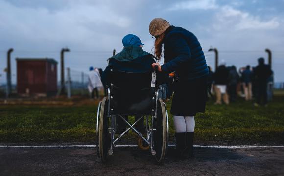 woman with man in wheelchair