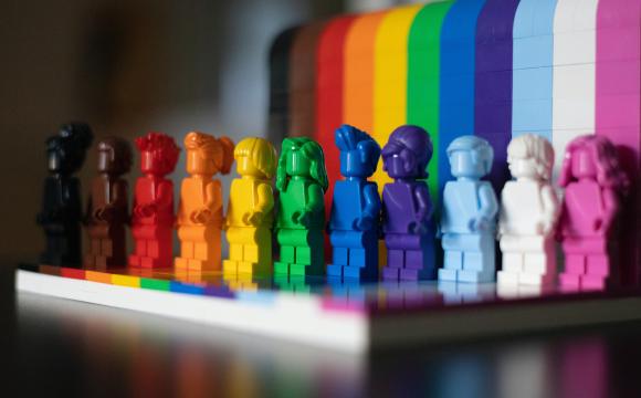 rainbow colored people figurines