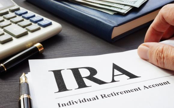 Documents about Individual retirement account IRA on a desk.