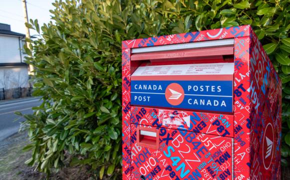 Kaleidoscope pattern Canada Post mailbox stock photo