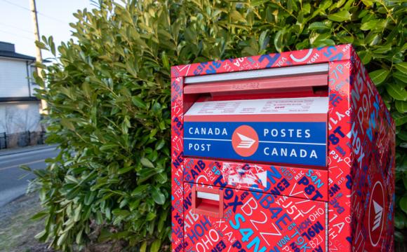 Kaleidoscope pattern Canada Post mailbox stock photo