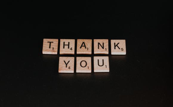 Thank you spelled out with letter tiles