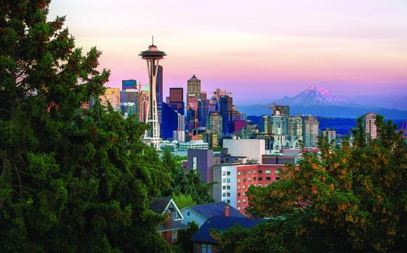 city landscape with the space needle on the horizon