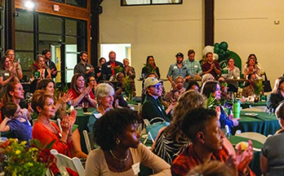 crowd of people at a meeting