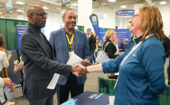 Exhibitors shaking hands