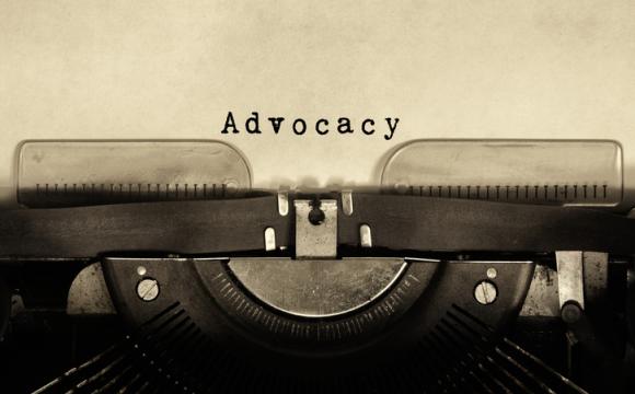 Advocacy word typed on vintage typewriter stock photo