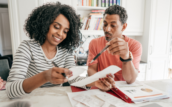 A couple reviewing their taxes