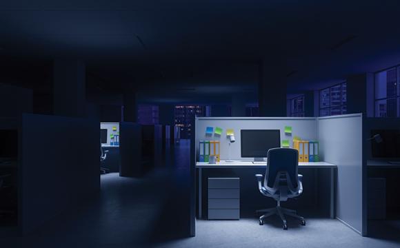 office space with a light on and a chair at a desk