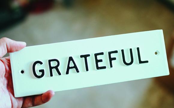 sign that says grateful